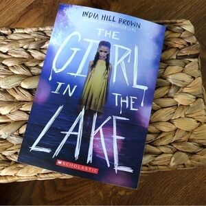 The Girl in the Lake by India Hill Brown, paperback book